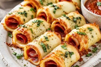 Thumbnail for Easy Cheesy Pizza Roll-Ups Recipe