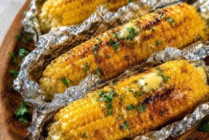 Thumbnail for Grilled Corn on the Cob in Foil with Garlic Butter